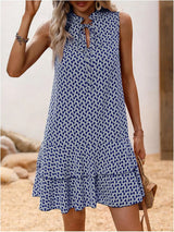 Inés | Sleeveless Dress with Elegant Print and Fluid Drape